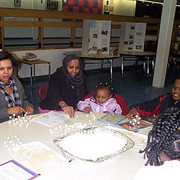 Working together to build marshmallow and toothpick bridges